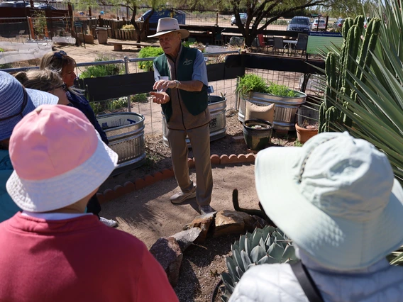 master gardener teaching in desert garden