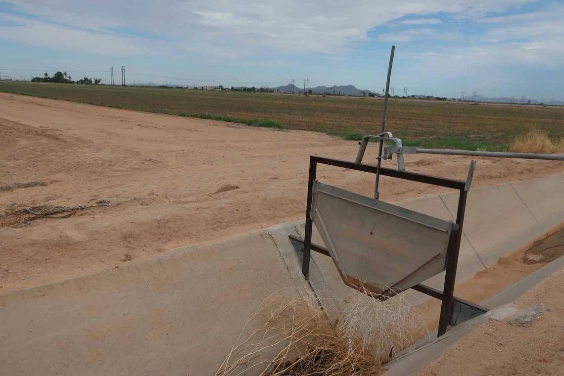 Photo of a dry irrigation ditch