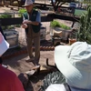 Photo of a master gardener giving a garden tour